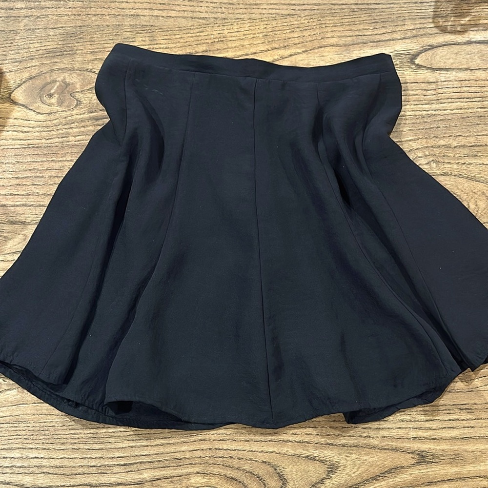 Show me your Mumu flowy mini skirt black size Medium